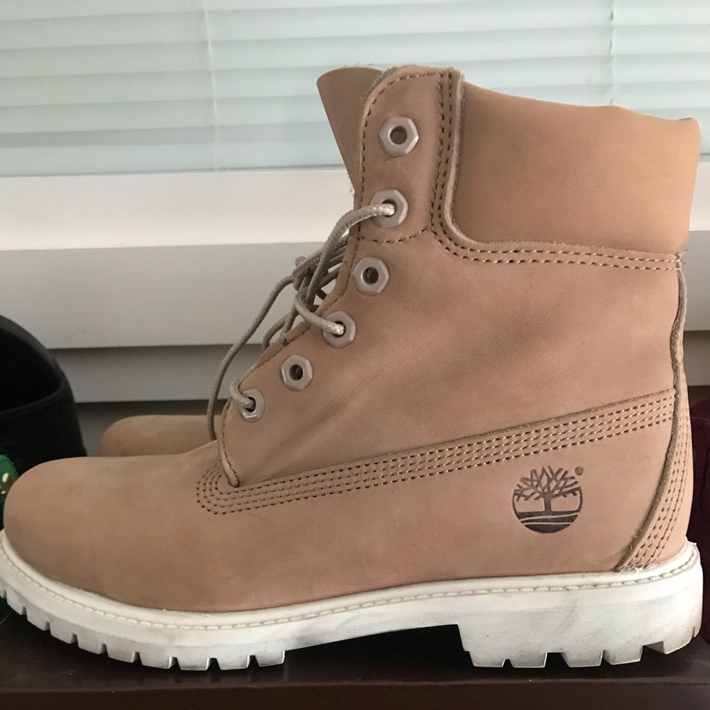 Tan and white timberland boots 8